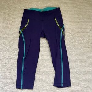 Purple Leggings with Teal and Yellow Accents